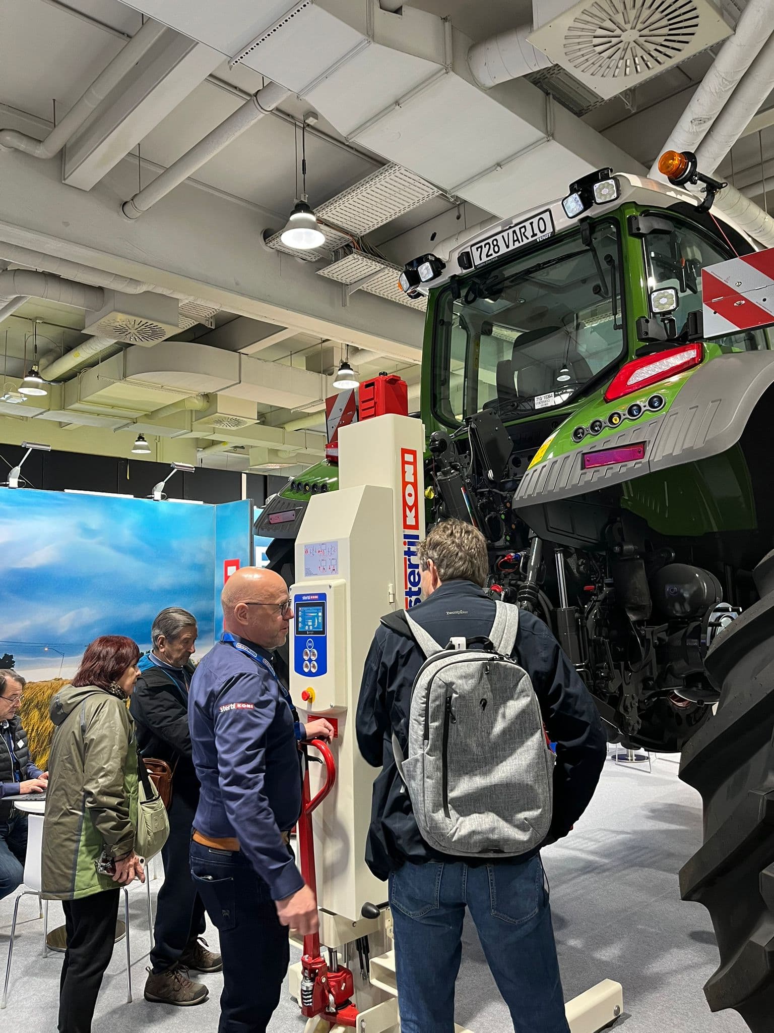 Fendt tractor lifted with Stertil-Koni mobile column vehicle lifts at stand Agritechnica show 2025