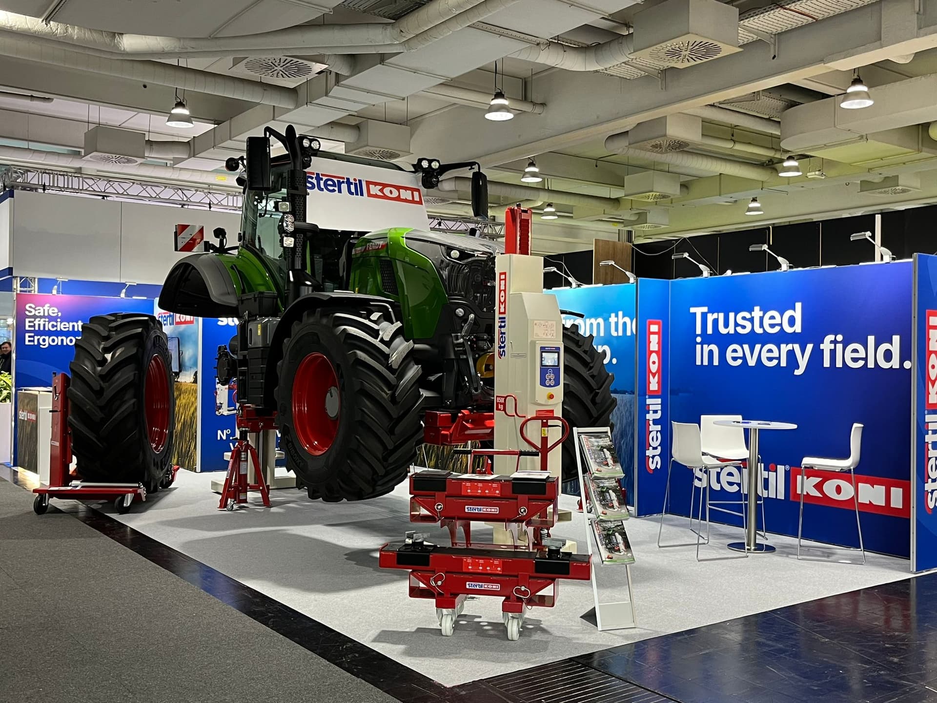 Fendt tractor lifted with Stertil-Koni mobile column vehicle lifts at stand Agritechnica show 2025