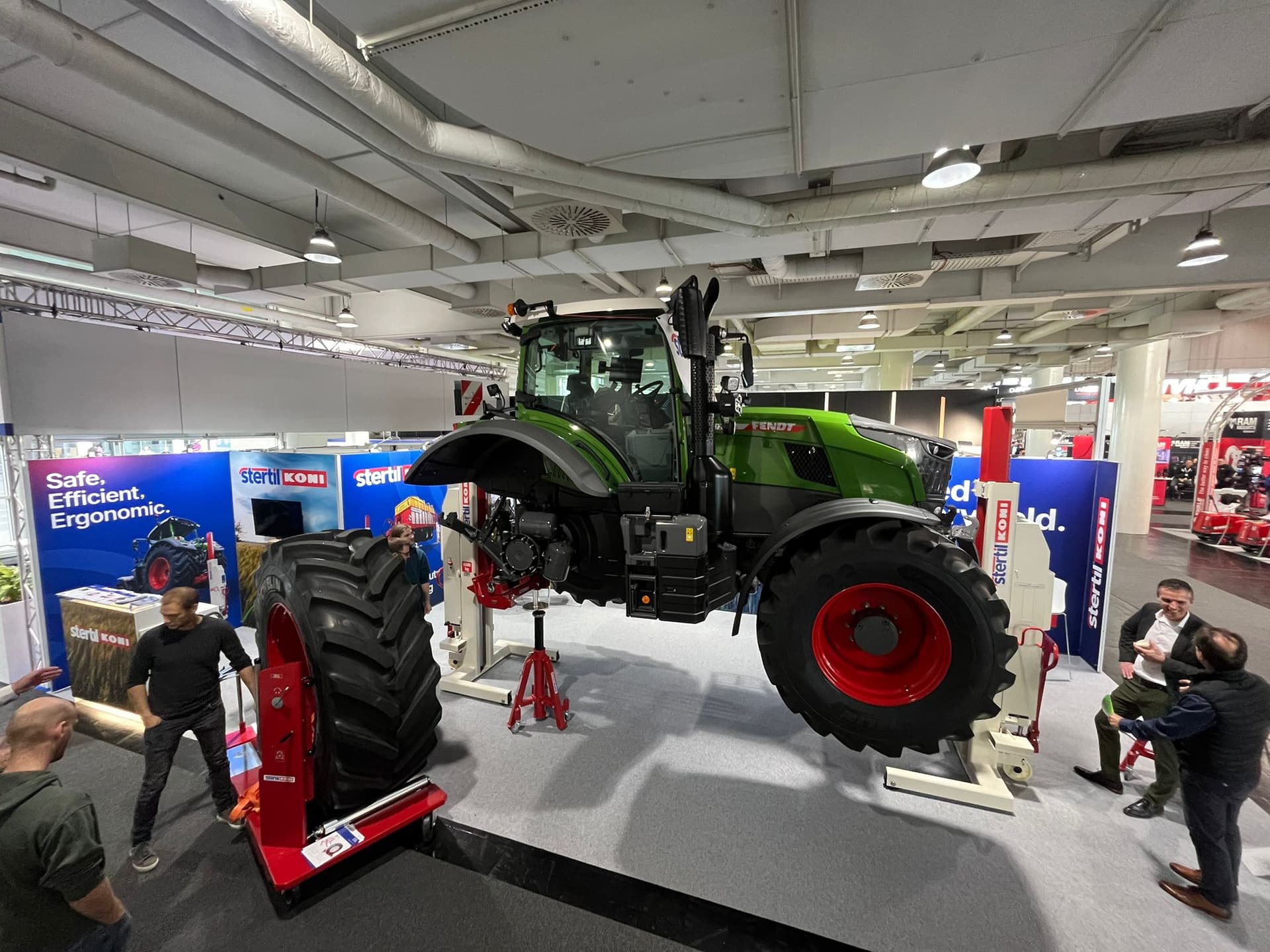 Fendt tractor lifted with Stertil-Koni mobile column vehicle lifts at stand Agritechnica show 2025