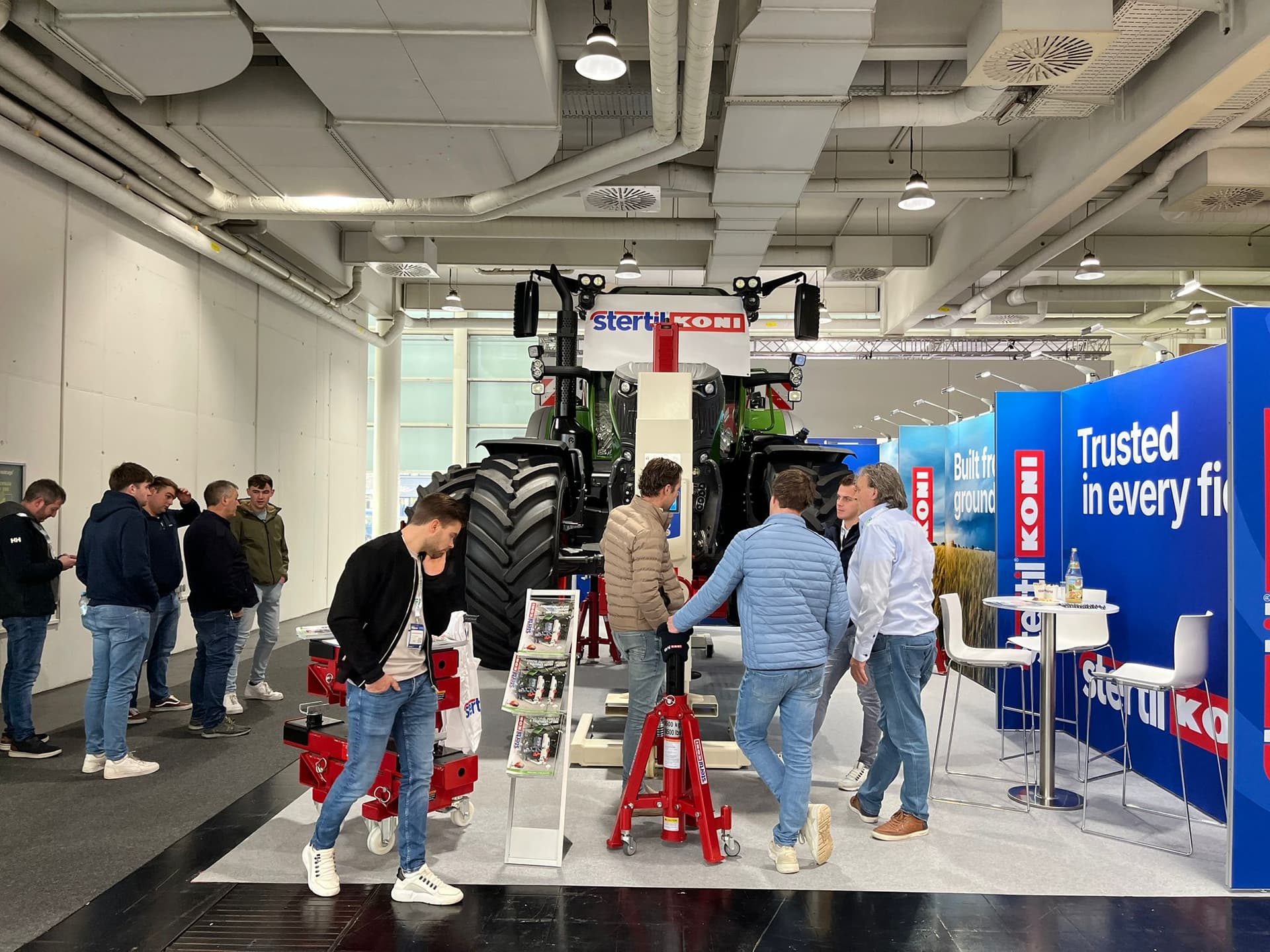 Fendt tractor lifted with Stertil-Koni mobile column vehicle lifts at stand Agritechnica show 2025
